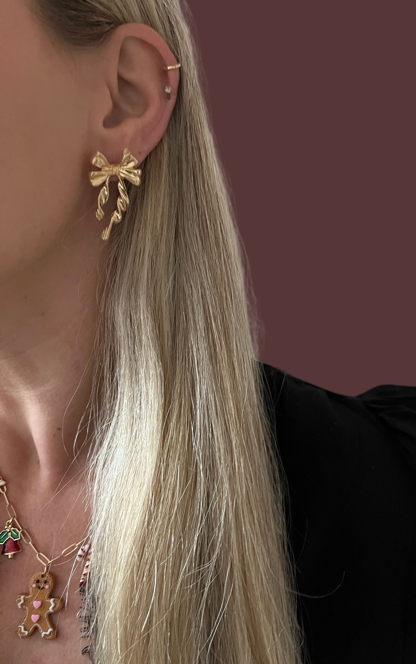 Strik oorbellen goud