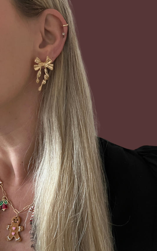 Strik oorbellen goud